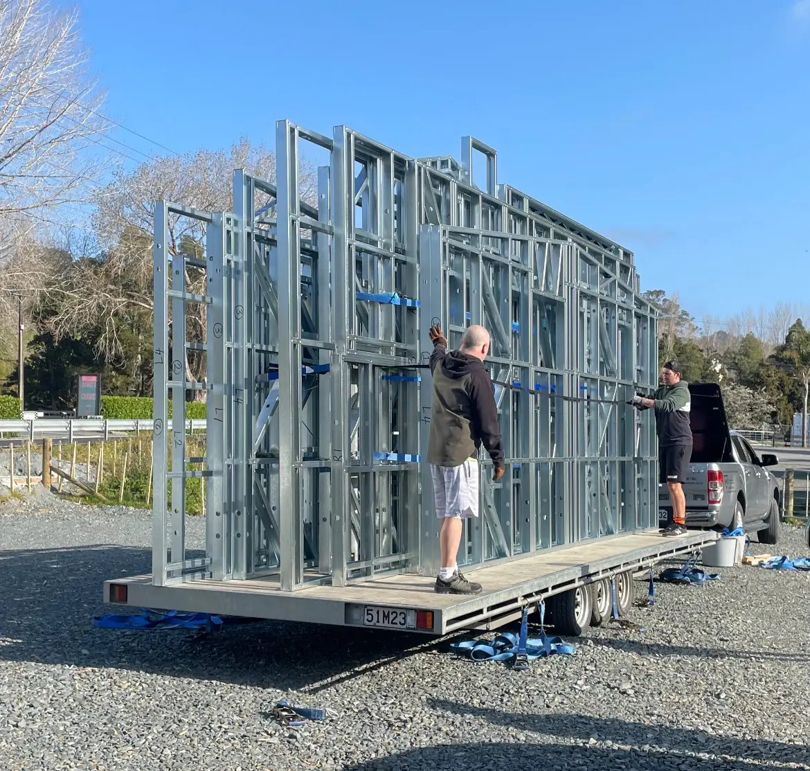 Kit set frames on a trailer, ready for delivery to a Pod and Co customer